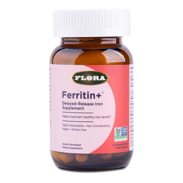 Ferritin + delayed release iron supplement bottle on white background